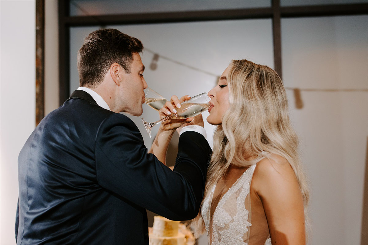 Courtney and Dalton Sipping Champagne