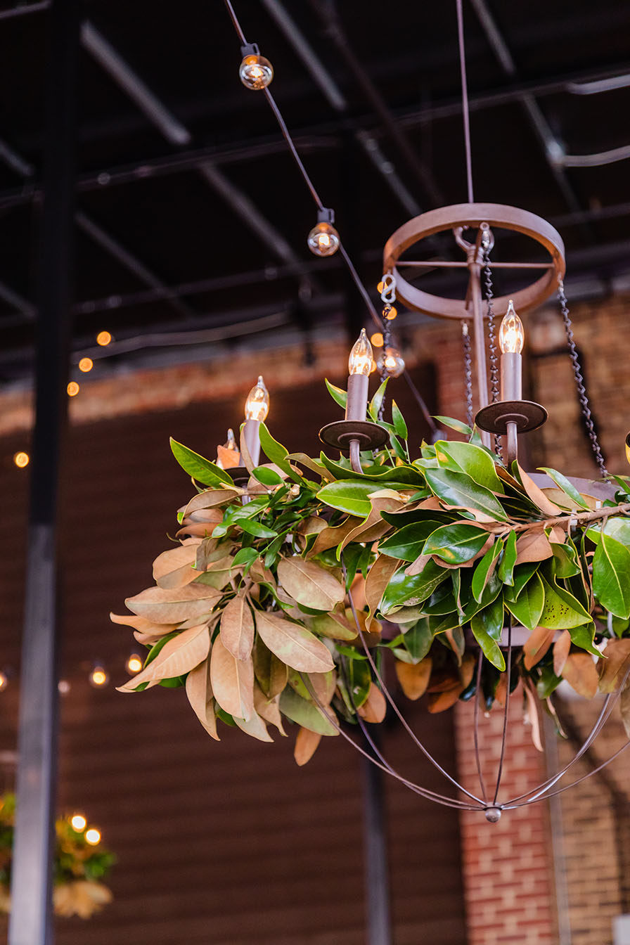 Iron Chandelier with magnolia leaf greenery