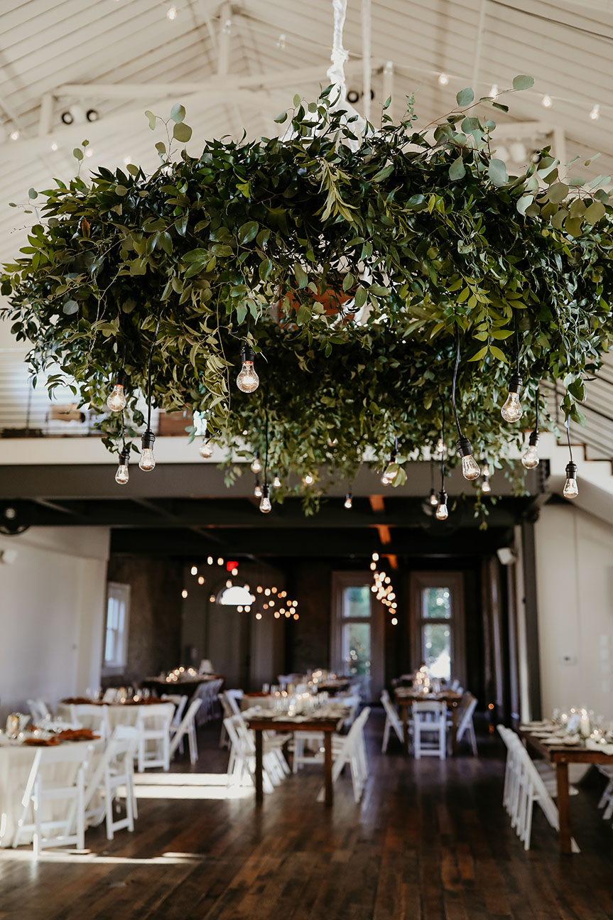 Greenery Ring with Edison Bulbs at Reception