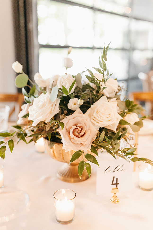 classic floral centerpiece with white and champagne colored florals