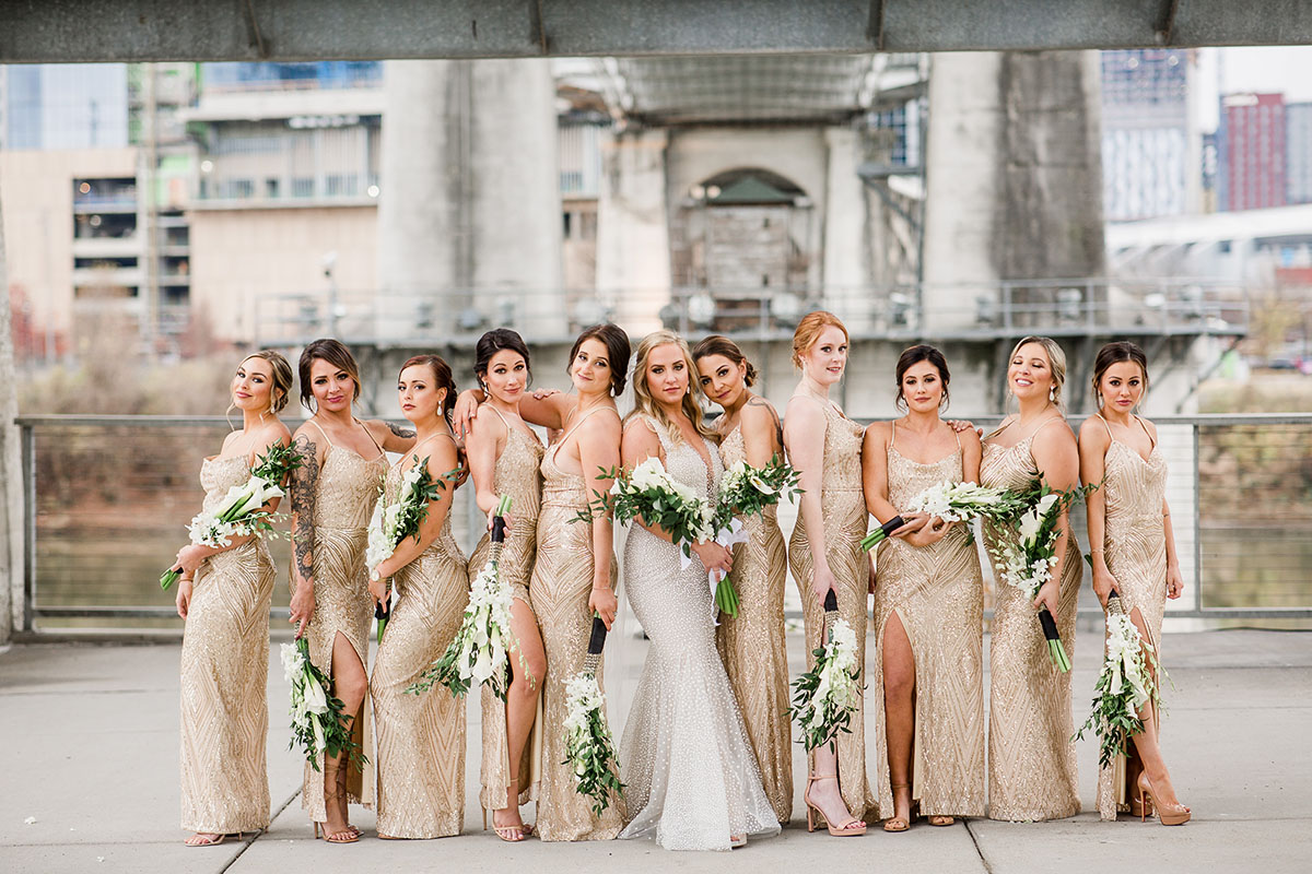Bride with Bridesmaids in Gold Glamorous Dresses