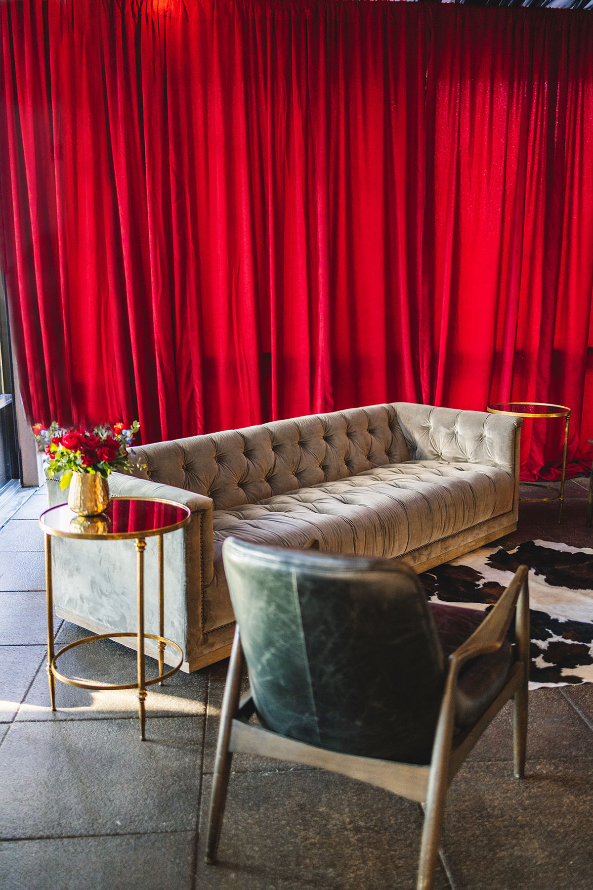 Modern Lounge Area with Red Velvet Draping