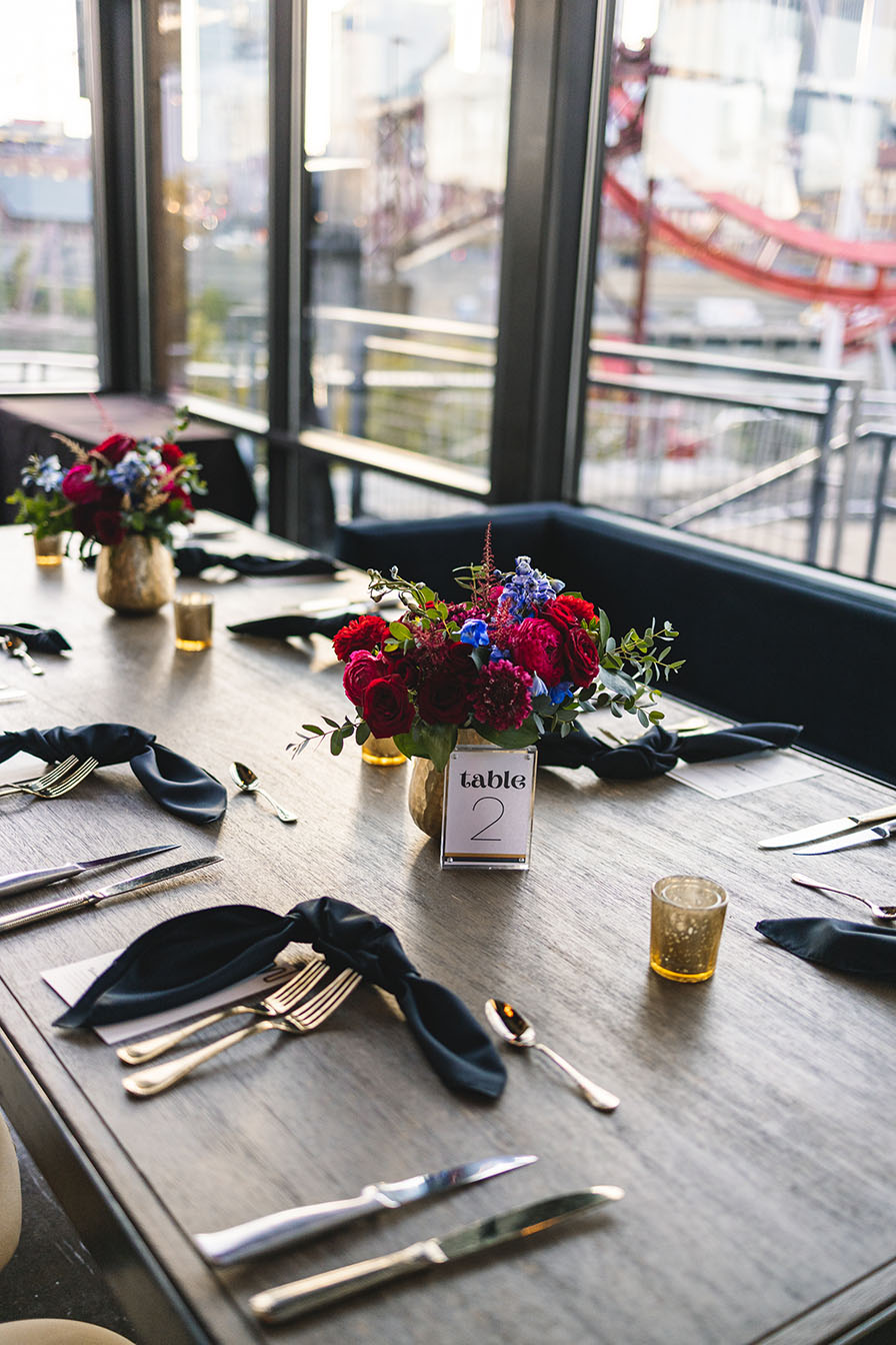 Modern Table Setting with Black Knotted Napkins