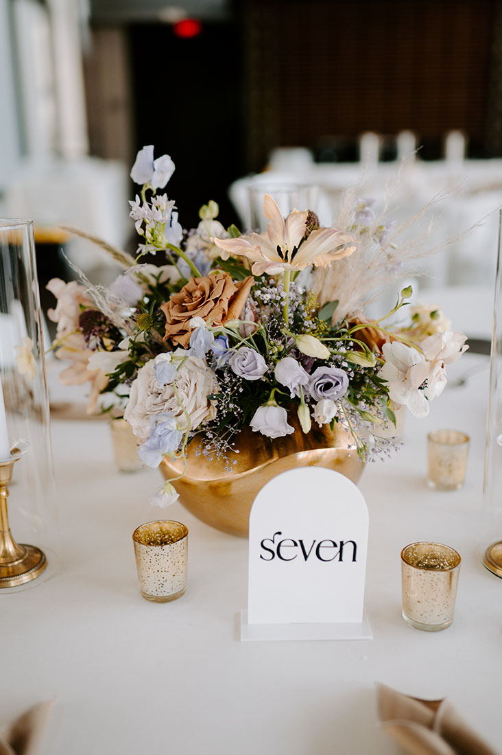 Modern Ceremony Centerpiece with Neutral Signage and Gold Details