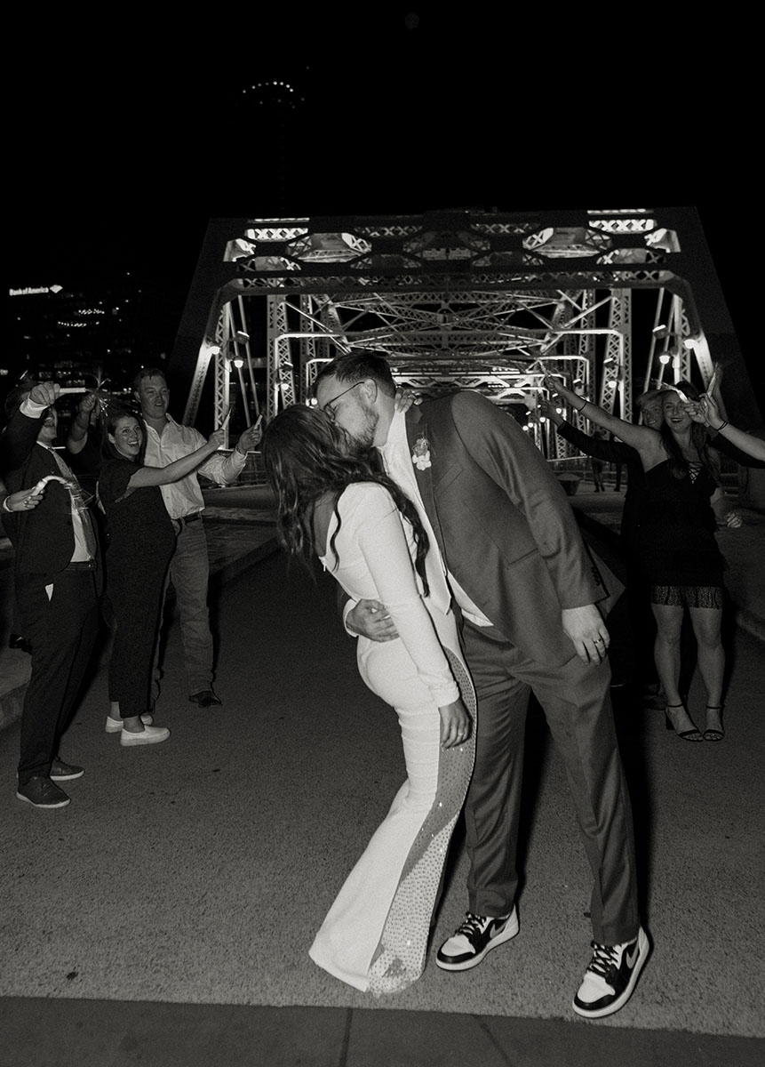 Alexis and Zach's Modern Wedding Exit on the Bridge in Nashville