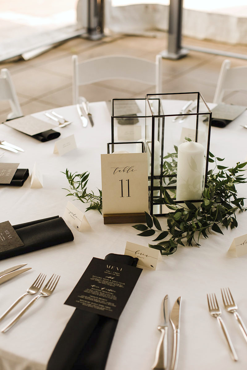 Minimal modern black and white wedding reception table setting