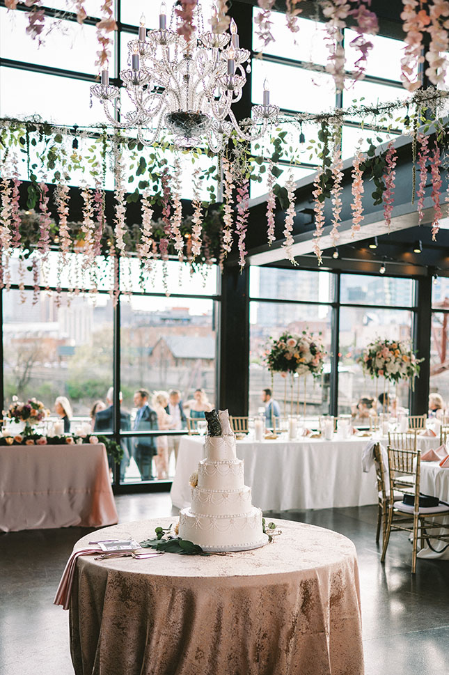 Whimsical Wedding Reception with Wisteria and Cake Table