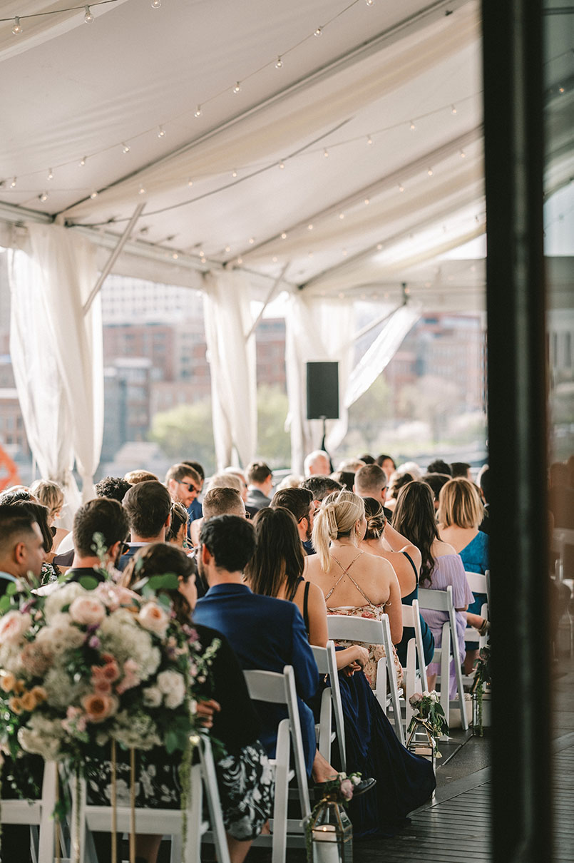 Guests Sitting for Rooftop Wedding Ceremony in Downtown Nashville
