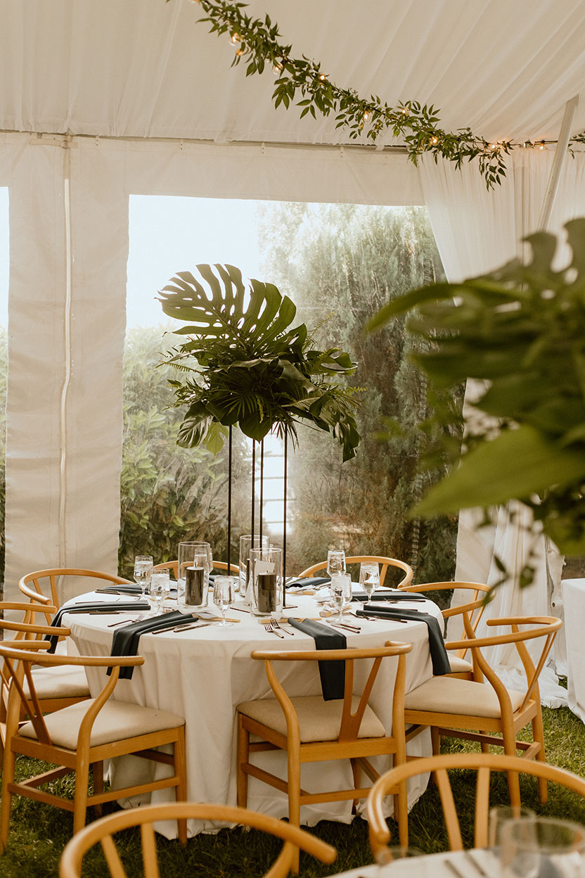 Tent at The Cordelle with Summer Wedding Reception Setup with Tropical Arrangements