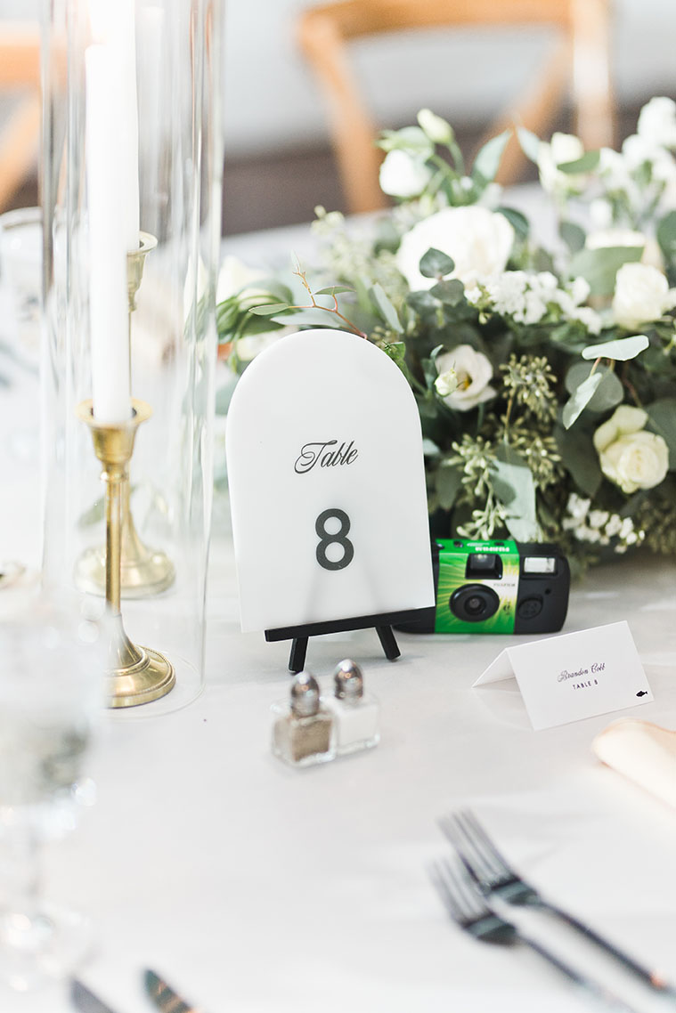 White Arch Table Number with Black Letters at Reception
