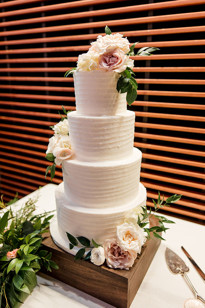 Gage and Brian's Classic Tiered Wedding Cake with Garden Inspired Floral