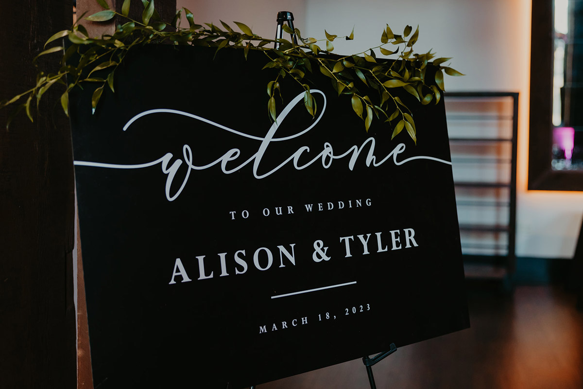 Ali and Tyler's Black and White Wedding Welcome Sign