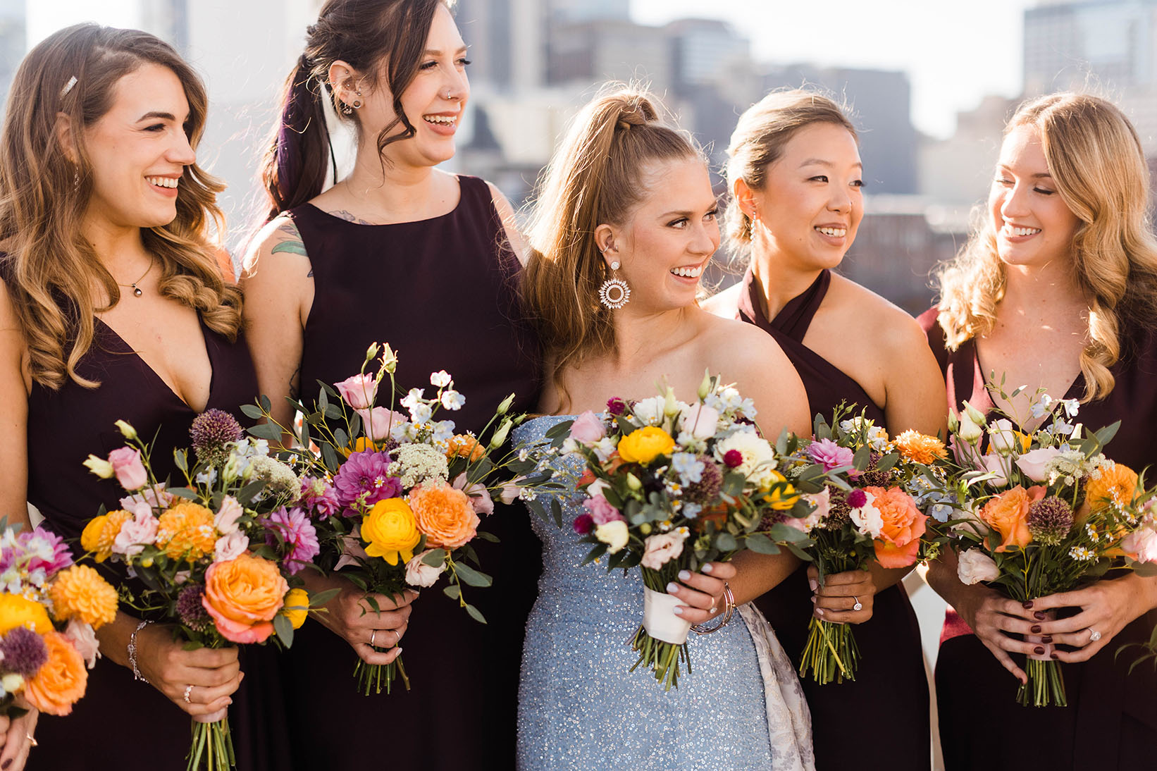 Emmy and Her Bridesmaids in Deep Purple Dresses