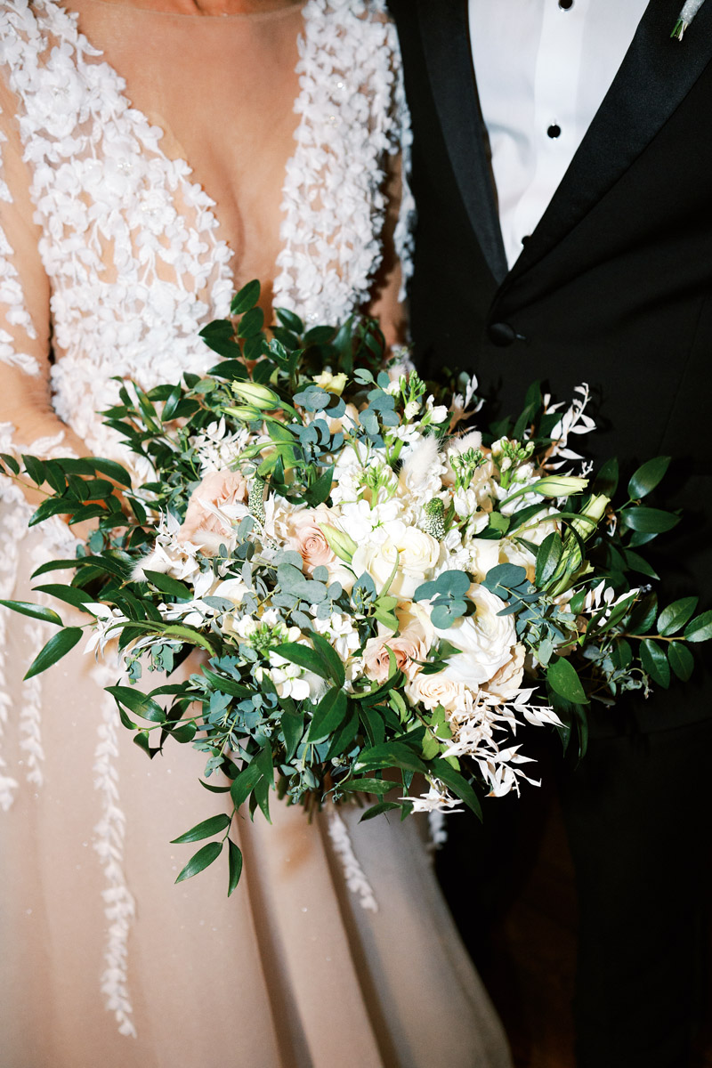 Closeup of Bride's Bouquet and Groom