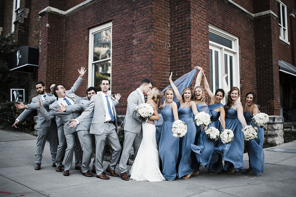 Jenna and Ben With Wedding Party Outside The Bell Tower