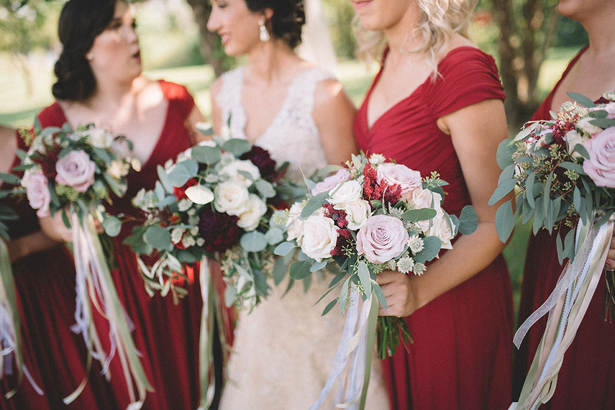 Bride and Bridesmaids Holding Bouquets