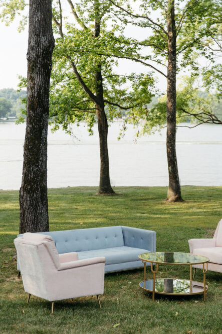 Blue and White Lounge Seating on lakeside Lawn