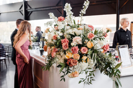 large floral arrangement on the patio bar
