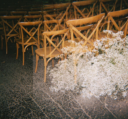 Film Photo of Ceremony Setup with Babys Breath Arrangement