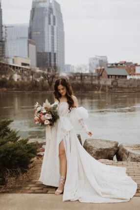 Bride by the Cumberland River in Her Bridal Gown