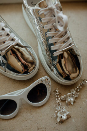 Silver Bridal Shoes and Accessories Flat Lay Photo