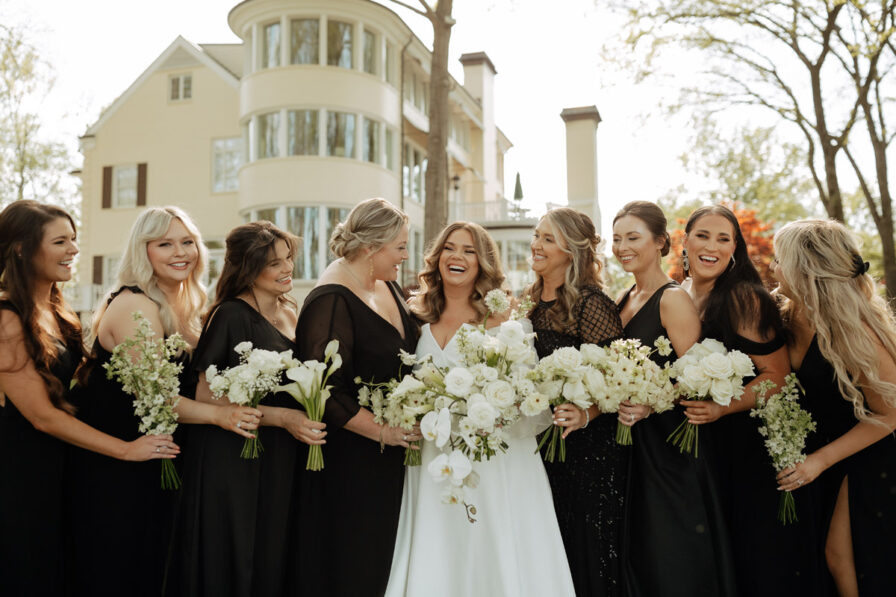 Sarah and Her Bridesmaids in Mixed Black Dresses with White Bouquets