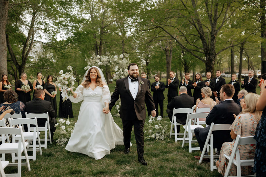 Sarah and Richard Walking the Aisle after the Ceremony