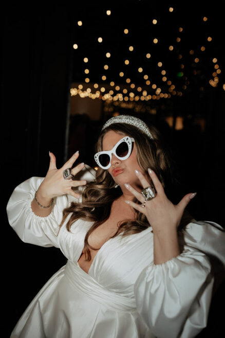 Sarah with Outfit Change and Sunglasses during Wedding Reception